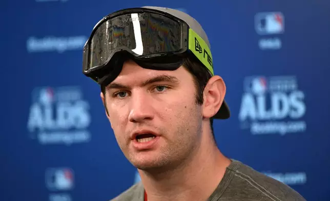 Cleveland Guardians pitcher Gavin Williams speaks during a news conference after Game 5 of baseball's American League Division Series against the Chicago White Sox, Saturday, Oct. 10, 2026, in Cleveland. (AP Photo/Phil Long)