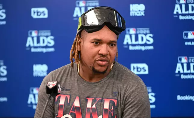 Cleveland Guardians third baseman José Ramírez (11) speaks during a news conference after Game 5 of baseball's American League Division Series against the Chicago White Sox, Saturday, Oct. 10, 2026, in Cleveland. (AP Photo/Phil Long)