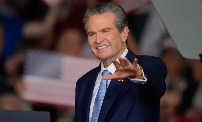 Georgia gubernatorial candidate Rick Jackson speaks before President Donald Trump arrives at a campaign rally at Dalton Municipal Airport, Friday, Oct. 16, 2026, in Dalton Ga. (AP Photo/Mike Stewart)