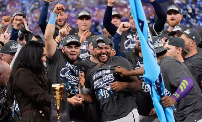 Tampa Bay Rays pitcher Freddy Peralta celebrates after their win against the Cleveland Guardians in Game 6 of an American League Championship Series baseball game in St. Petersburg, Fla. Monday, Oct. 19, 2026. (AP Photo/David J. Phillip)