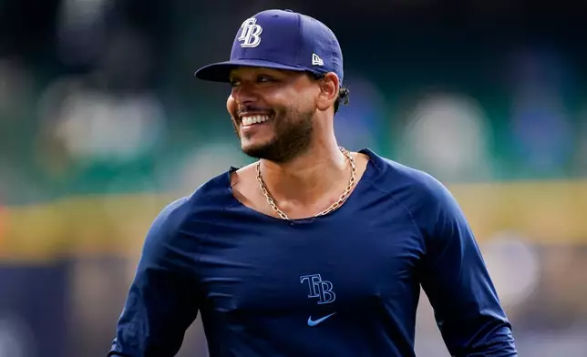 Tampa Bay Rays pitcher Freddy Peralta warms up prior to Game 2 of baseball's World Series, Saturday, Oct. 24, 2026, in Milwaukee, between the Milwaukee Brewers and the Tampa Bay Rays. (AP Photo/Kayla Wolf)