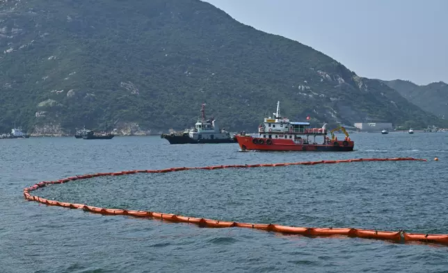 The annual marine pollution joint response exercises, code-named "Oilex 2026" and "Maritime Hazardous and Noxious Substances (HNS) 2026", were conducted by various government departments this morning (October 22) in the waters off Mo Tat Wan of Lamma Island to test their marine pollution responses in the event of a spillage of oil and HNS in Hong Kong waters. Photo shows an oil pollution combat team deploying floating booms as a barrier to prevent the spill from spreading. Source: HKSAR Government Press Releases