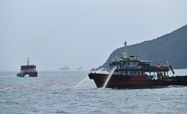 The annual marine pollution joint response exercises, code-named "Oilex 2026" and "Maritime Hazardous and Noxious Substances (HNS) 2026", were conducted by various government departments this morning (October 22) in the waters off Mo Tat Wan of Lamma Island to test their marine pollution responses in the event of a spillage of oil and HNS in Hong Kong waters. Photo shows a pollution control vessel simulating the spraying of oil dispersant with water onto oil on the sea surface. Source: HKSAR Government Press Releases