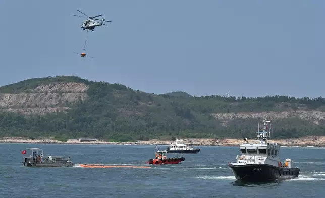 The annual marine pollution joint response exercises, code-named "Oilex 2026" and "Maritime Hazardous and Noxious Substances (HNS) 2026", were conducted by various government departments this morning (October 22) in the waters off Mo Tat Wan of Lamma Island to test their marine pollution responses in the event of a spillage of oil and HNS in Hong Kong waters. Photo shows an oil spill response team cleaning up spilled oil on the sea surface. The Government Flying Service and other response groups also performed tasks at the scene. Source: HKSAR Government Press Releases