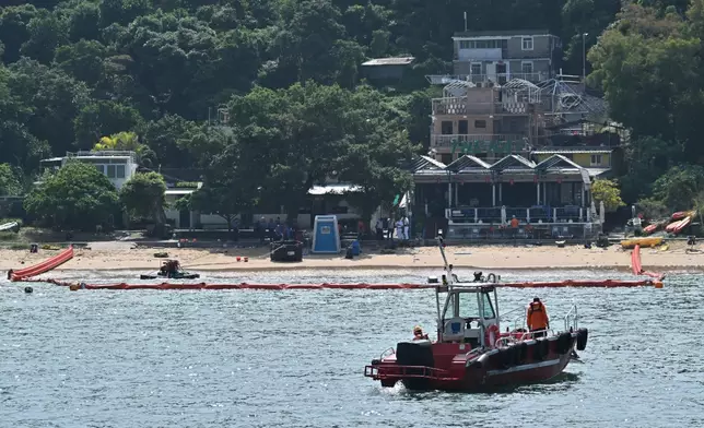 The annual marine pollution joint response exercises, code-named "Oilex 2026" and "Maritime Hazardous and Noxious Substances (HNS) 2026", were conducted by various government departments this morning (October 22) in the waters off Mo Tat Wan of Lamma Island to test their marine pollution responses in the event of a spillage of oil and HNS in Hong Kong waters. Photo shows a shoreline cleaning team conducting a shoreline oil clean-up drill at the non-gazetted beach of Mo Tat Wan. Source: HKSAR Government Press Releases