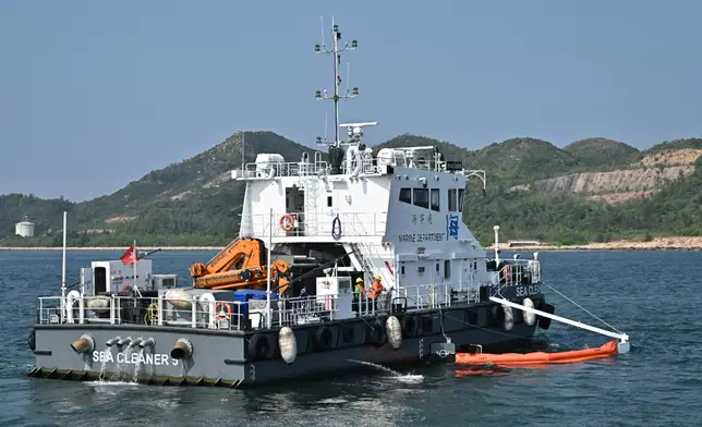 The annual marine pollution joint response exercises, code-named "Oilex 2026" and "Maritime Hazardous and Noxious Substances (HNS) 2026", were conducted by various government departments this morning (October 22) in the waters off Mo Tat Wan of Lamma Island to test their marine pollution responses in the event of a spillage of oil and HNS in Hong Kong waters. Photo shows the Marine Department's vessel, "Sea Cleaner 5", simulating the cleanup of an oil spill at sea. Source: HKSAR Government Press Releases