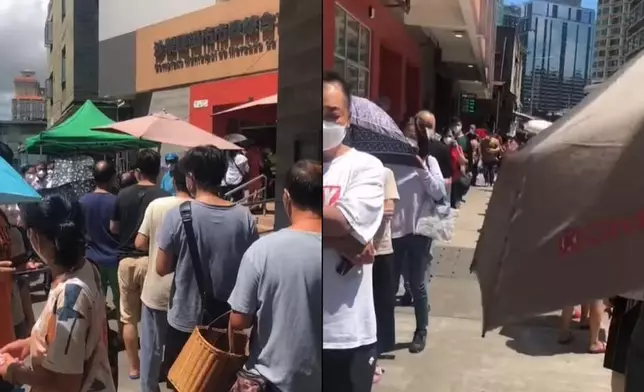 在澳門沙梨頭街市，今日有數十名市民烈日當空下排隊等入街市。澳門高登起底組片段截圖