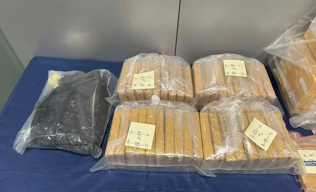 警方檢獲懷疑海洛英及約懷疑大麻花，總市值共約1100萬元 (警方圖片)