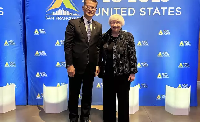 陳茂波和美國財政部長耶倫拍照 (陳茂波網誌圖片)