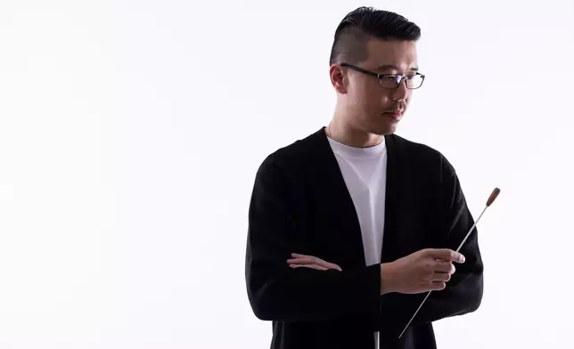 康樂及文化事務署音樂事務處中樂組高級音樂主任郭健明。