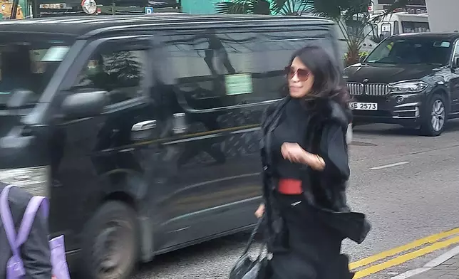 黎智英太太李韻琴離開。《巴士的報》記者攝