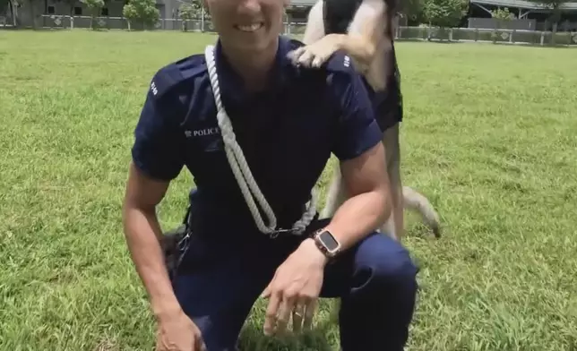 退役警犬Mike和主人高康