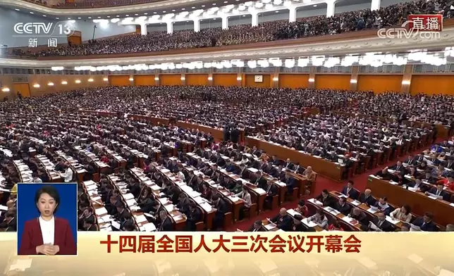 第十四屆全國人大三次會議今早9時在北京人民大會堂開幕。央視直播截圖
