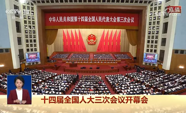 第十四屆全國人大三次會議今早9時在北京人民大會堂開幕。央視直播截圖