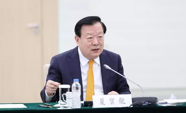 夏寶龍星期一 (5月12日)與工商界人士座談，對港澳工商界和企業家提出4點希望。澳門新聞局圖片