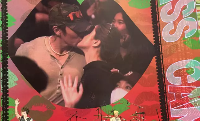 Tyson Yoshi與未婚妻Christy被鏡頭捕獲時上演深情一吻。（本網記者攝）