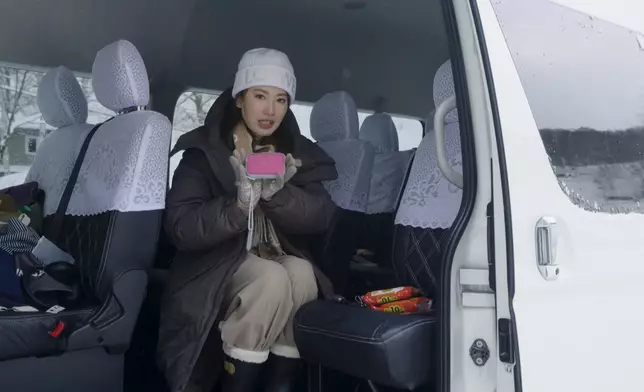 Angel自備靚相機影靚相。