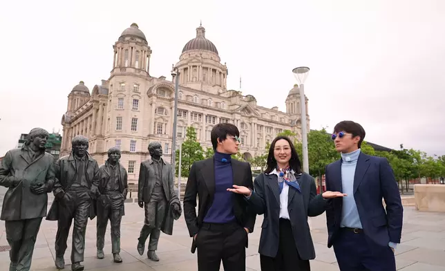 高海寧、周嘉洛、黃庭鋒一身Beatles造型遊利物浦市