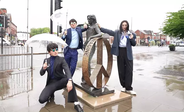 高海寧、周嘉洛、黃庭鋒一身Beatles造型遊利物浦市