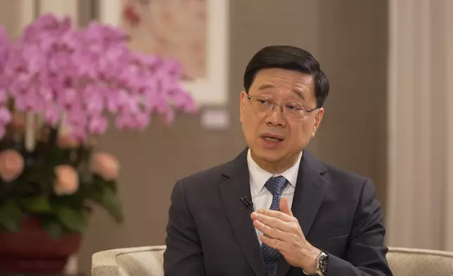 李家超接受「粵港澳媒體灣區行」訪問團視頻專訪時談及在改善民生方面的成績。