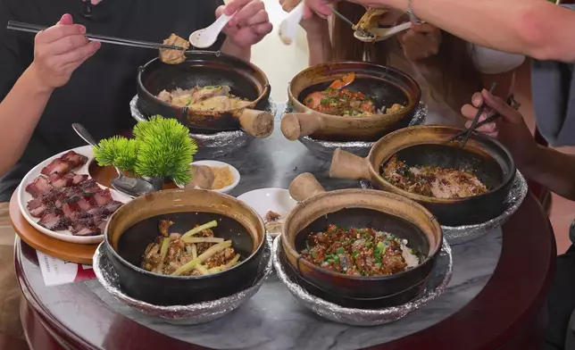 被形容為天花板級的煲仔飯。