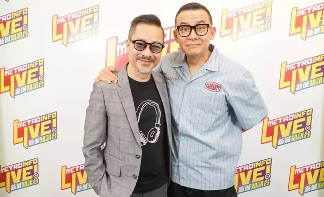 雷頌德、梁兆煇（左）合照。