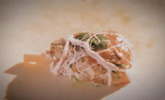 莫明總廚以豬網油重新入饌。