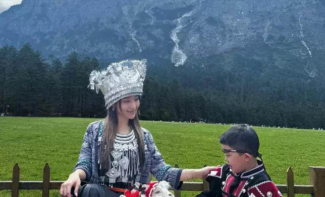 完全不似已為人母。