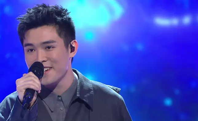 鄧偉謙Theodre獻唱《2084》。