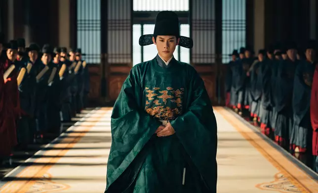 周奇（飾 莊之行）