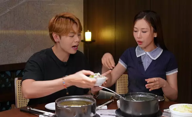 Archie食唔停口 裝咗一大碗粥。