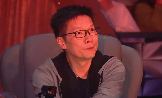 趙增熹報以「謎之微笑」。