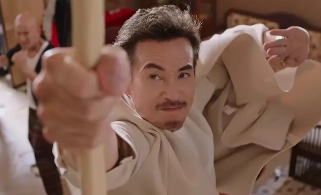 陳豪舞起白蠟杆上嚟有型有款。