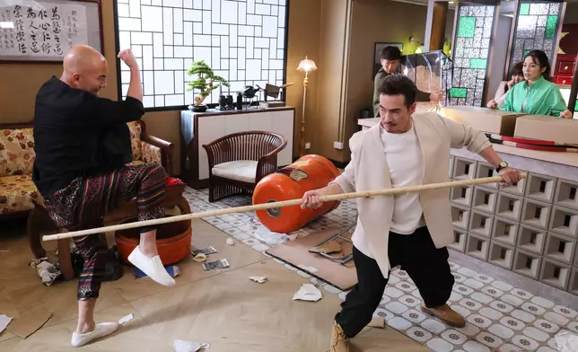 陳豪舞起白蠟杆上嚟有型有款。