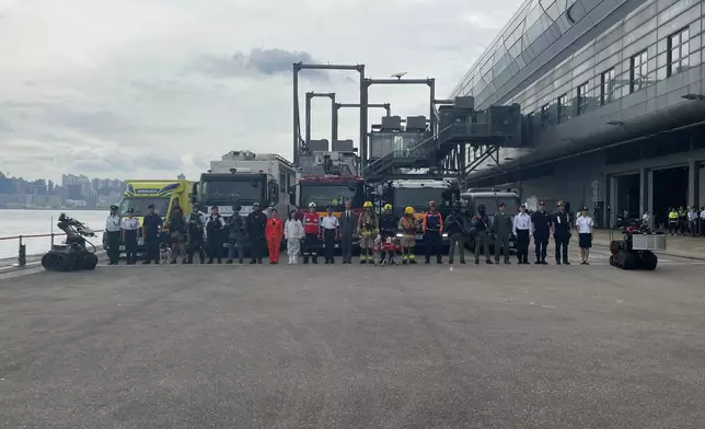 演習後各部門代表大合照。巴士的報記者攝