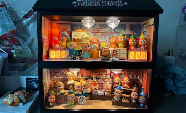 Amber為星星公仔DIY的屋仔。