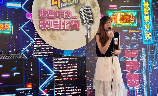 亞軍陳愛琪演唱。