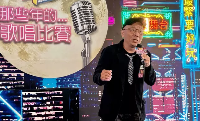 季軍吳錦榮演唱。