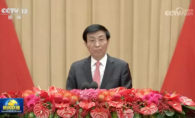 王滬寧發表講話。央視截圖