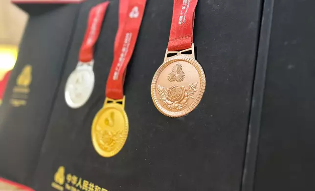 獎牌體現中西元素融合。巴士的報記者攝