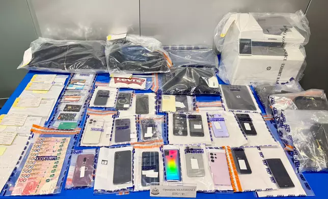 犯罪集團將報失身份證以AI換臉再開戶洗黑錢1.9億，警方搜獲大批證物。