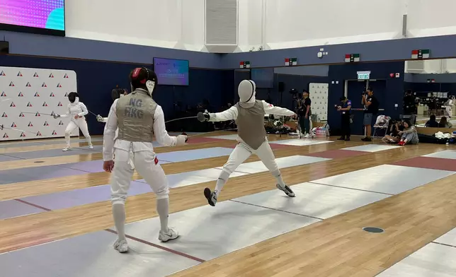 香港劍擊運動員星期五會見傳媒。巴士的報記者攝