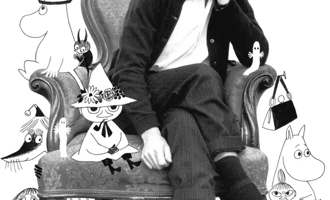 芬蘭藝術家托芙・揚松(Tove Jansson)與筆下角色。