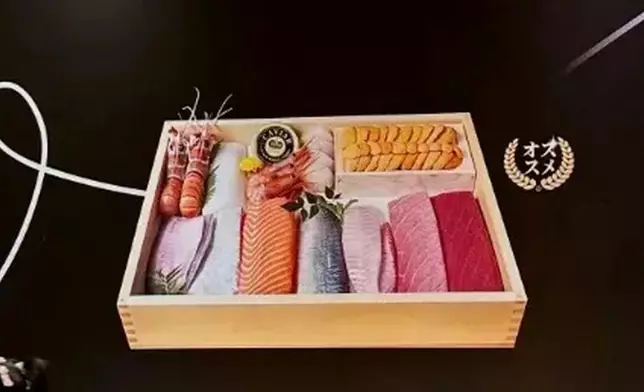 日式料理店更換新版廣告圖被嘲似「摺疊內褲」。影片截圖