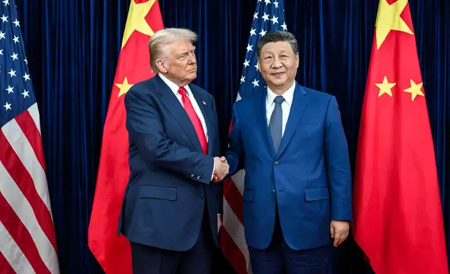 特朗普和習近平握手。白宮官網圖片