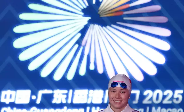 香港泳手何詩蓓在十五運會女子200米自由泳決賽，奪得冠軍 。新華社圖片