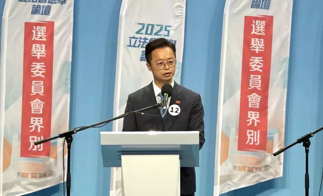 12號候選人洪錦鉉。巴士的報記者攝