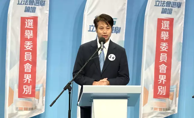 14號候選人何俊賢。巴士的報記者攝