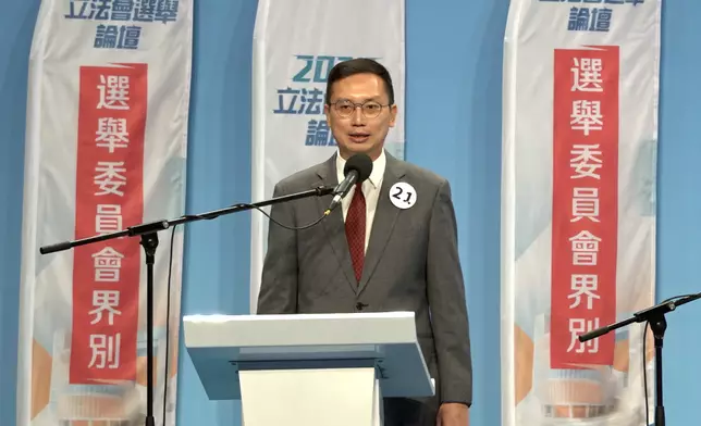 21號候選人李鎮強。巴士的報記者攝