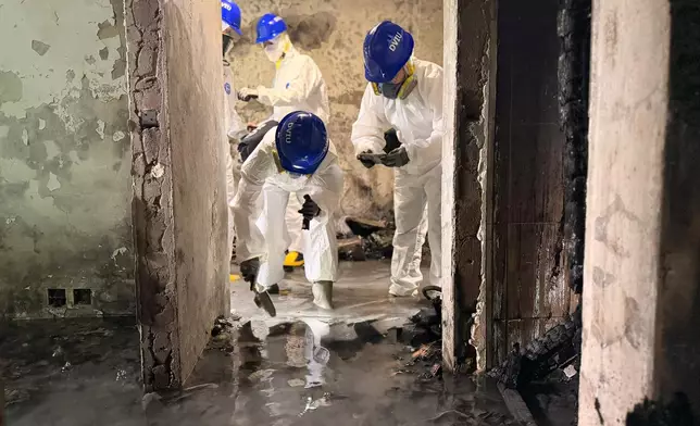 大埔宏福苑五級火，DVIU早前進入火災現場搜索。警方圖片